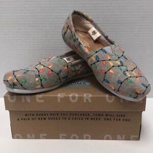 Toms flow in dark tree lights slip on shoe